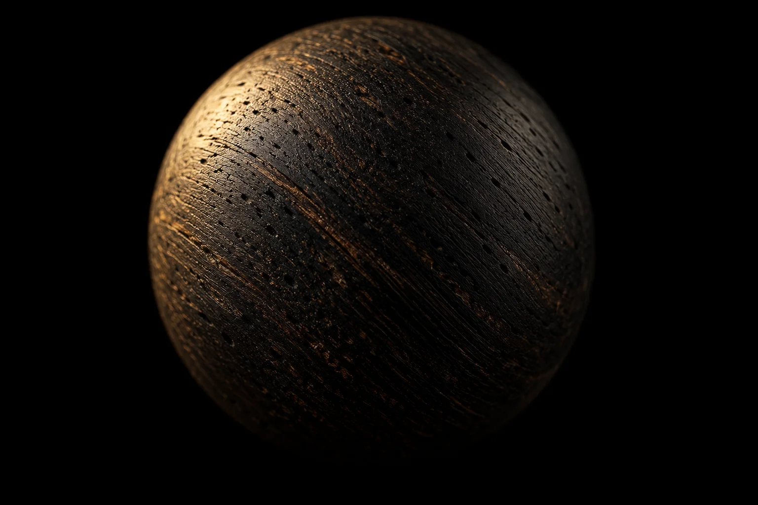Close-up of the fine natural grain on an ebony bead